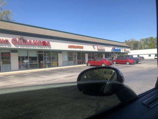 Outside parking lot of "Alterations"  hungry?? grab some dominos while you wait lol