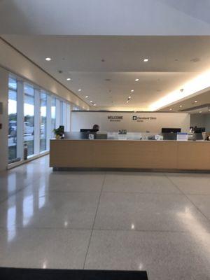 Front desk at the Egil and Pauline Braathen Center building where the Neurology Center is on 4th floor