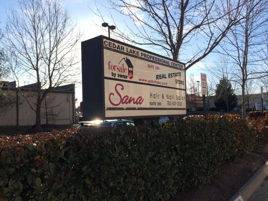 Sign, right behind the IHOP & martial arts center