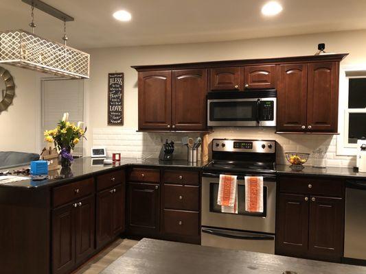 Paint, new backsplash, lighting & floors