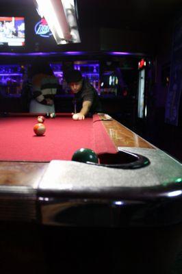 A bar with a pool table is always a good time.