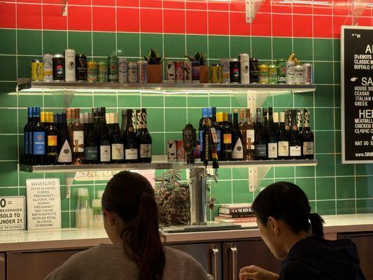 The bar right by the counter area where you could eat your food. There were tables as well.