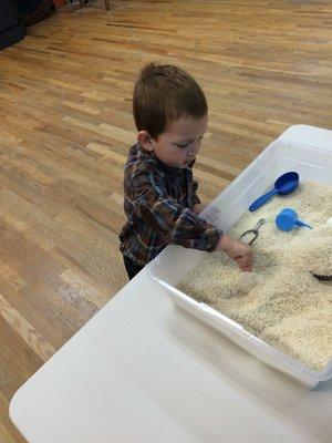 at the rice table in our 3 yr old preschool class!  Creative Minds Bright MInds!