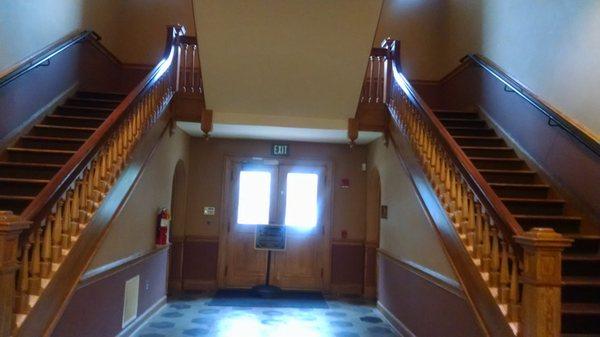 I love these dual staircases that lead to the courtroom on the second level.