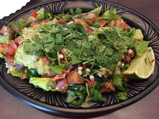 Romaine "salad", including fresh jalapeno slices, cilantro, corn salsa, pico, and of course, meat, light amount rice/beans $7ish