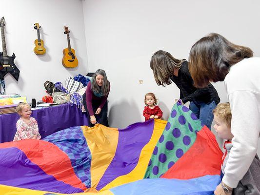 Parachute fun with Mrs. Bonnie