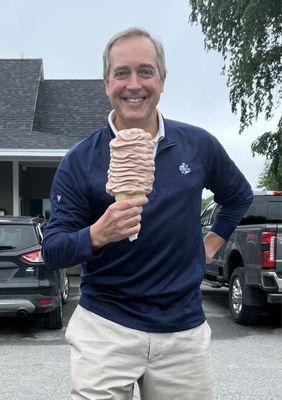 My husband's smile is almost as big as this large soft serve!