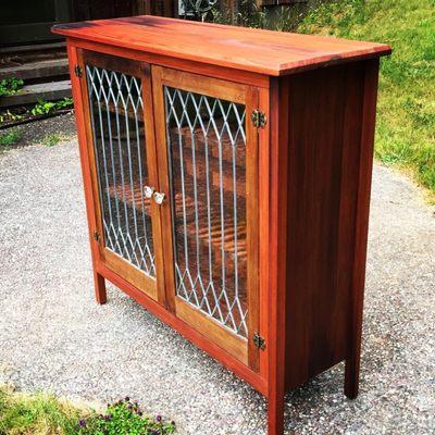 handmade old growth redwood cabinet with antique doors.