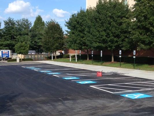 Asphalt parking lot and sidewalk Holiday INN bowling GREEN