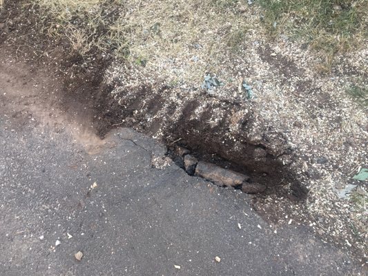 Damaged driveway from equipment