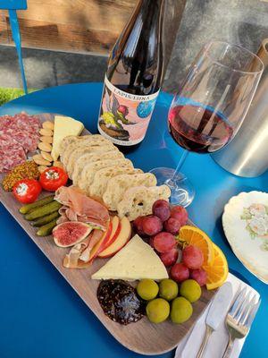 Glass of wine and charcuterie board