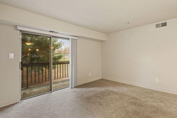 Living area with private balcony.