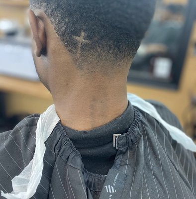 Bald taper with cross design
Haircut by: Xavier