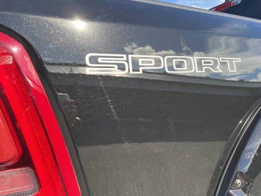 Right side "sport"  sticker BEFORE removal