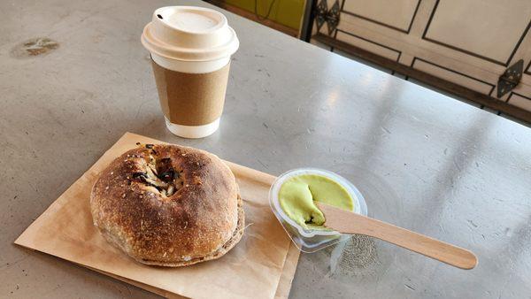 Bialy pastry with avocado smear and a matcha