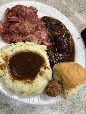 Steak and gravy, mashed potatoes and some cherry cobbler from the hot bar.