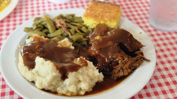 Pot roast, mashed potatoes, green beans and corn bread