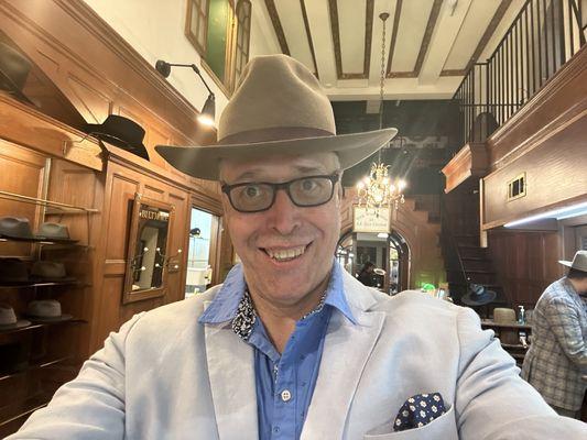 Me, at JJ Hat Center, with my resized Stetson! They did great work!