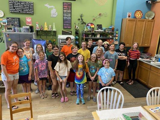 Summer campers! The kids make multiple projects out of glass, clay and mosaics as well as learn pottery painting techniques too.