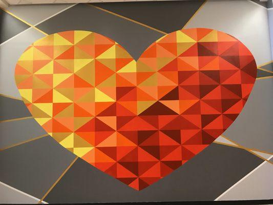 "Love" section of "Peace, Love, Unity" mural at La Palmera Mall created by K Space Contemporary's Mural Arts Program