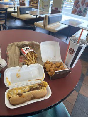 Chili cheese hot dog, fries and cheese curds.