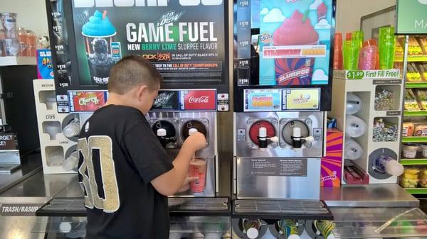 Getting his slurpee on!