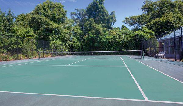 Play a match at the onsite tennis court