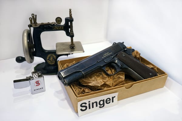 Yes, we have a 1911-A1 Singer.