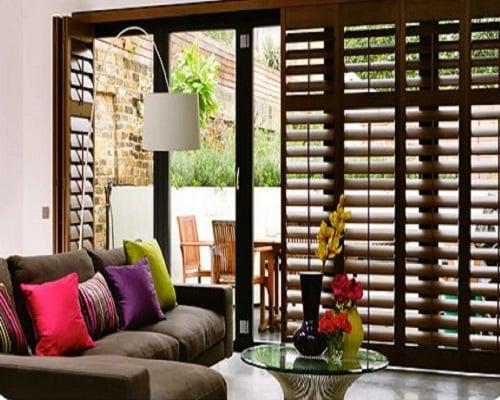 bi-fold shutters - walnut stained