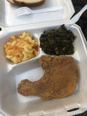 Pork chop sandwich, greens, and mac n cheese