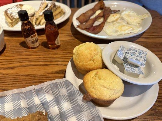 Cornbread muffins, fried eggs over medium, bacon & French toast