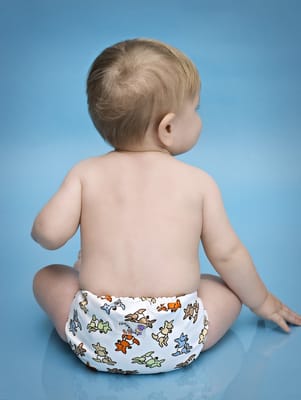 Baby in Rumparooz One Size Diaper (Kangaroo Print)