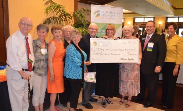 Community Foundation check award to Mary & Martha House.