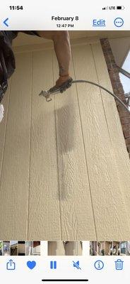 Spraying exterior paint