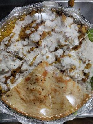 Chicken over rice white sauce only and a side of pita