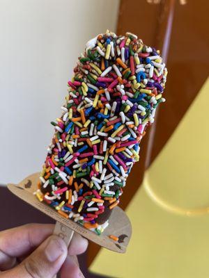 Vanilla dipped in dark chocolate and sprinkles