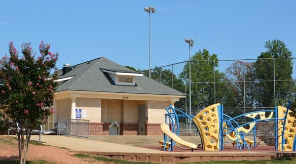 Restroom facilities and play area for younger kids