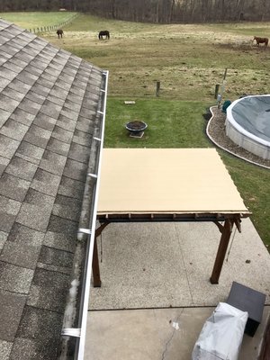 Gutter cleaning at a home in the country in Heath,OH.