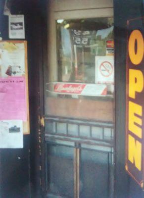 Oakland Store entrance. That Leinenkugels's door push had been on there since the first time I visited the store around 1968.