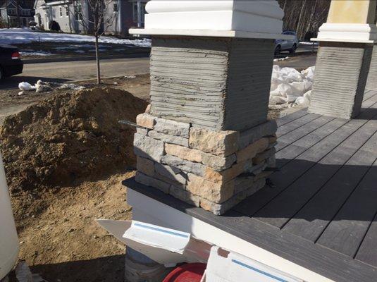 Rock pillars on your porch.