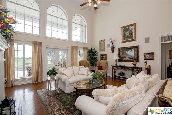 living room with vaulted ceilings