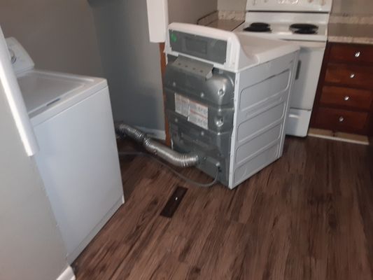 Deep cleaning behind appliances.