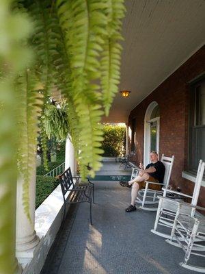 Front porch and happy guest.