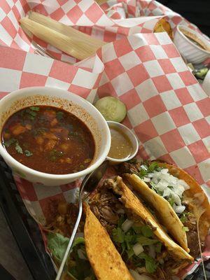 Birria tacos. Tamale in background.