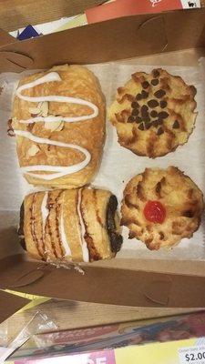 Two croissants, two coconut cookies, a stuffed bread, a cheese bread, and a gargantuan sticky bun ran just $10