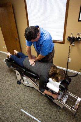 Dr. Ficklin adjusting a patient