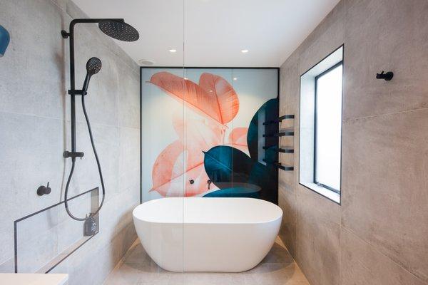 Printed glass bathroom wall.