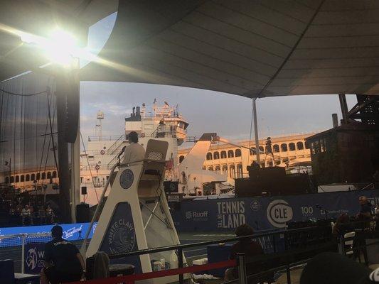 25 August 2021 -- Tennis In the Land (WTA 250 event) - Zhang v. Sands match (ship passing by)