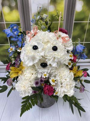 This puppy bouquet will be sure to brighten someone's week!