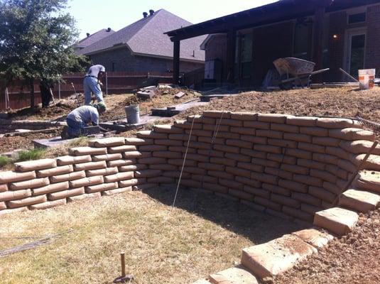 This was another up-grade in Irving that matched the homeowners other bag wall and added a new Venetian Paver patio look...